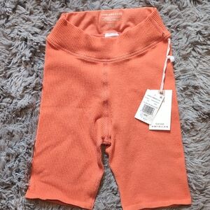 Good American Orange Biker Ribbed Shorts